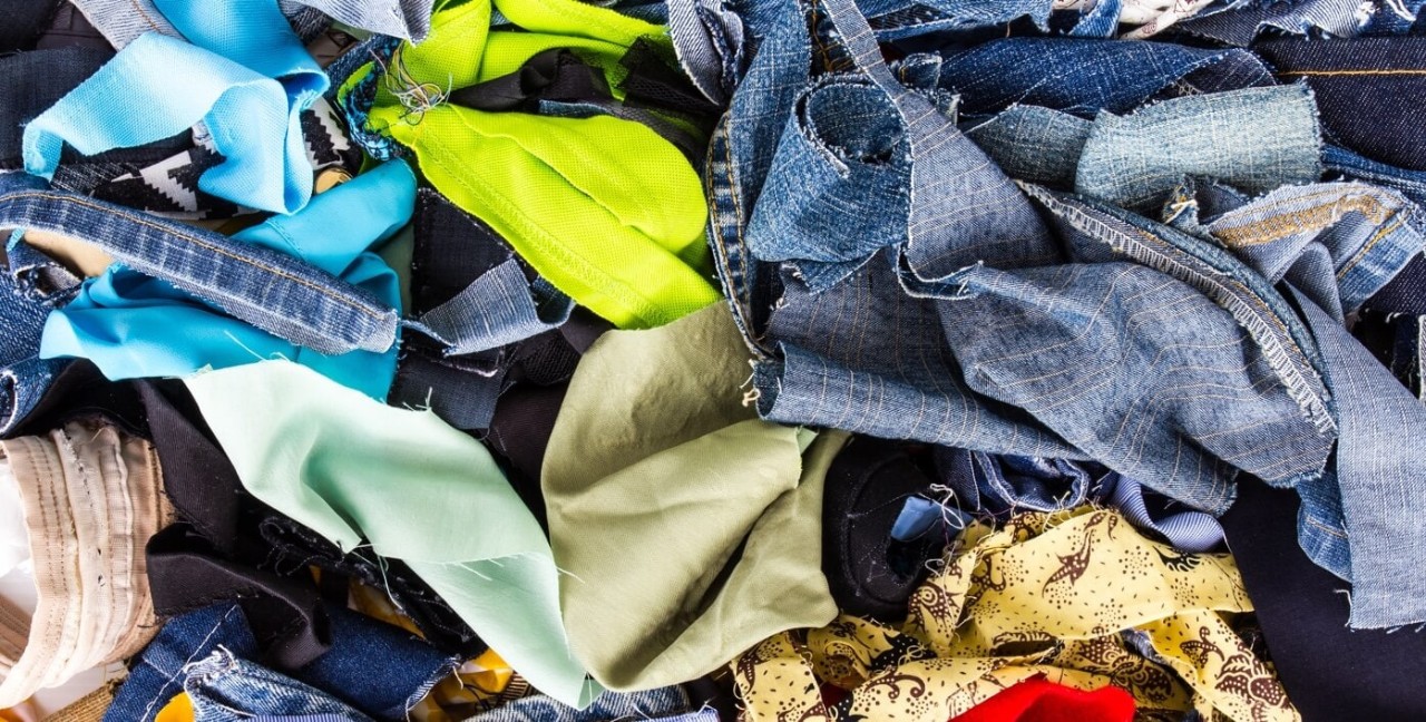 Scraps of cut up clothing materials.